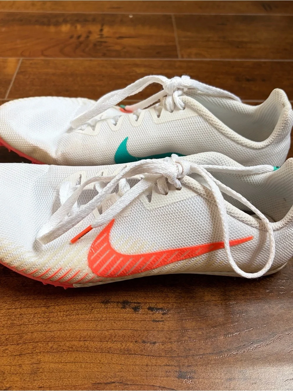 Nike Women’s White Track Spikes with Coral & Teal Accents